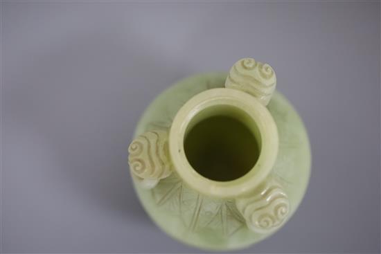 A pair of Chinese carved jade vases and covers, height 12cm